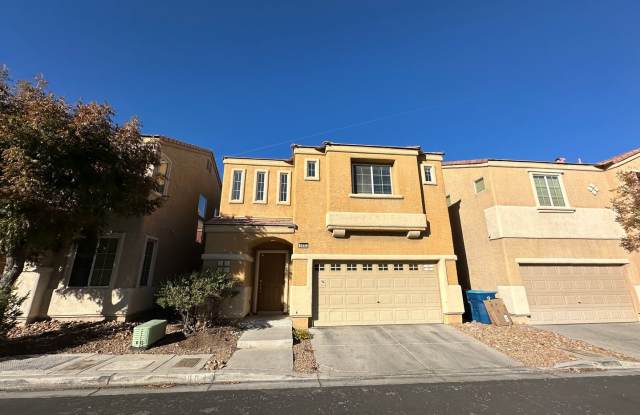 Photo of Charming 3 bed/2.5 bath single-family home in the heart of Blue Diamond! Tiled, downstairs entryway leads to combined kitchen and living room. Upstairs is bathed in natural sunlight, lots of accent windows and wood-rail staircase!