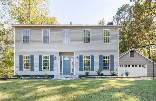 This Charming Two-Story Home Awaits You