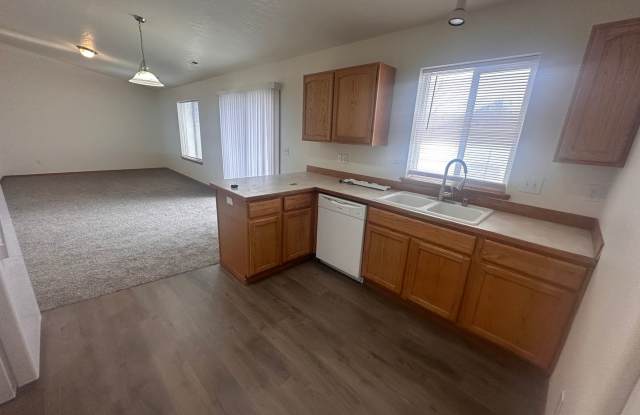 Newer Carpet, flooring & paint! 3 Bedroom 2 Bath with 2 car attached garage.