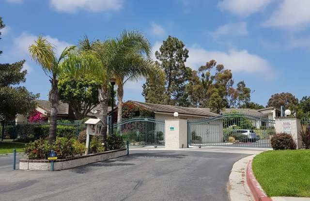 Vey nice 2+2 ground level condo with 2-car garage in a quiet, gated community