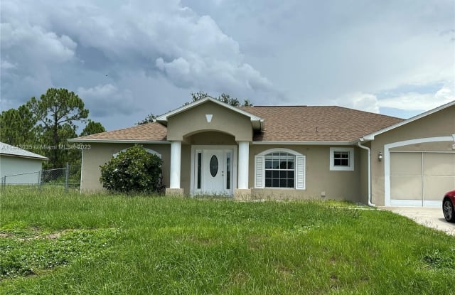 1102 Rush Ave - 1102 Rush Avenue, Lehigh Acres, FL 33972