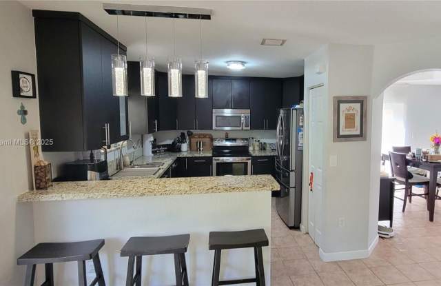 8760 Southwest 213th Lane