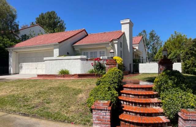 Gorgeous Single Story Home in The Coveted Valencia Summit Community!