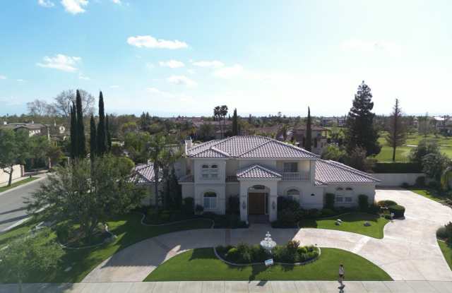 Elegant 6-Bedroom Estate with Balconies in Grand Island at Seven Oaks