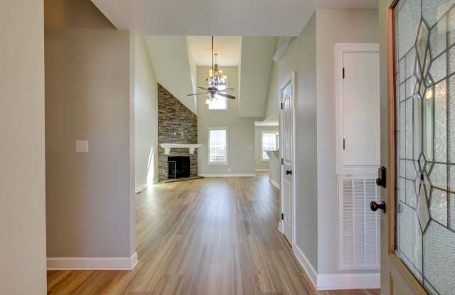 Fantastic Open Floor Plan Home With Stone Front Fireplace, Stainless Steel Appliances, And Close to Restaurants, Shopping and Fort Campbell.