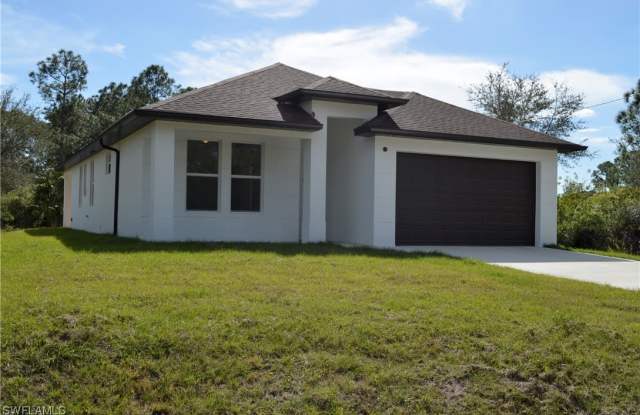 970 Lakeside Drive - 970 Lakeside Drive, Lehigh Acres, FL 33974