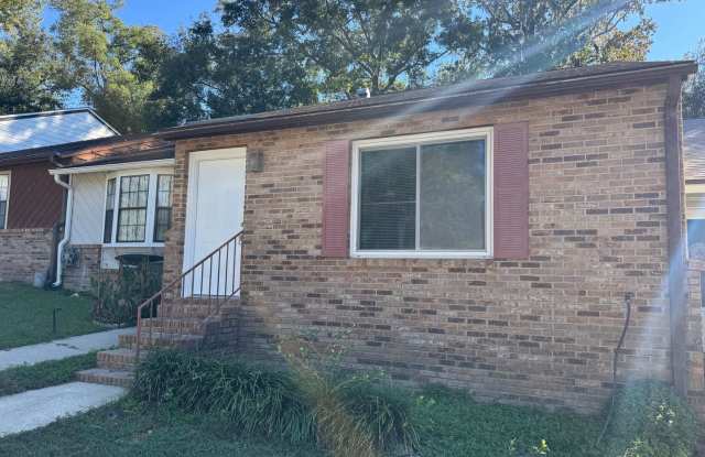 Great Location! Updated Townhouse Conveniently Located To Downtown  Tom Brown Park!