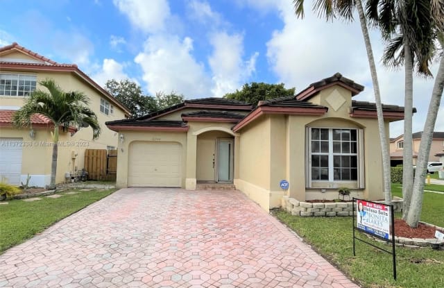 12240 SW 137th Ter - 12240 Southwest 137th Terrace, Three Lakes, FL 33186