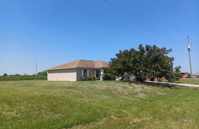 Coming Early May 3 bedroom 2 bathroom single family home - 3808 Northwest 38th Street, Cape Coral, FL 33993