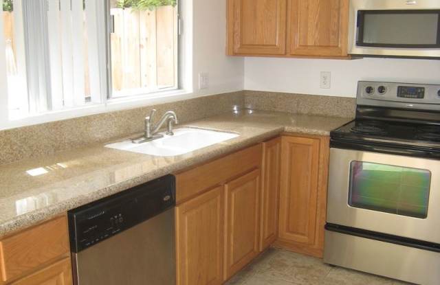 Start The new Year in this centrally located Townhome in the Cascade Gardens Community!!!