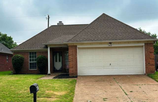 Move In Ready! Fresh Paint! Fridge Included! Split Bedroom Floor Plan! Fenced In Backyard!