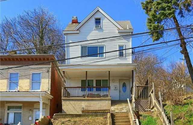Spacious newly updated 3 bedroom - modern huge kitchen, great private outdoor garden space.