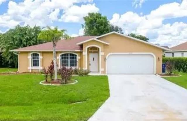 2502 Elva Place - 2502 Elva Place, Lehigh Acres, FL 33971