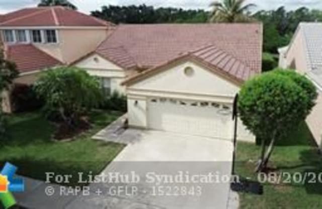 392 CARRINGTON DR - 392 Carrington Drive, Weston, FL 33326