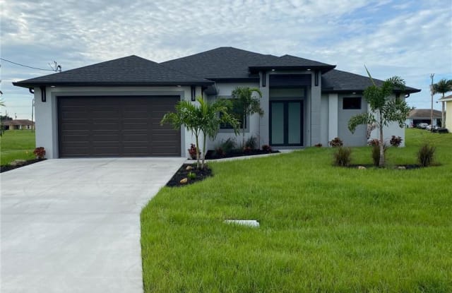 702 NW 2nd LN - 702 Northwest 2nd Lane, Cape Coral, FL 33993