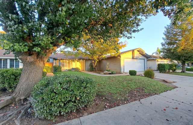 Charming Fresno Home with Beautiful Curb Appeal!