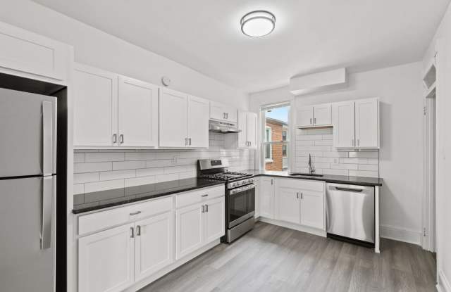 Spacious 1 Bedroom Apartment with Den - In Unit Laundry!