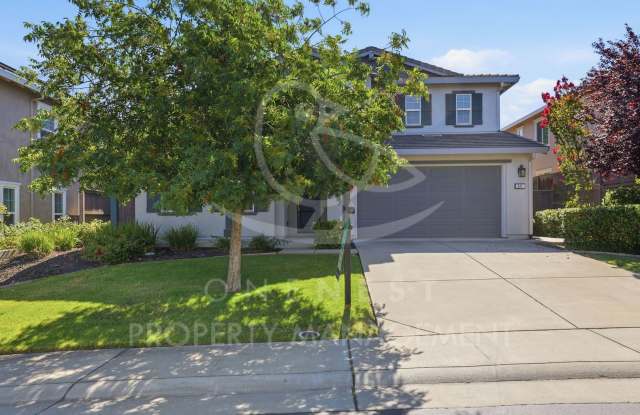 spacious 4-bedroom, 2.5-bathroom home in the desirable Whitney Ranch