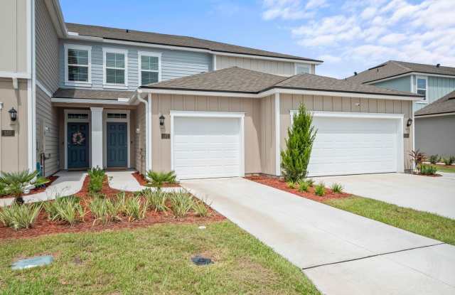 Stunning townhouse located in the gated community of The Trails of Palm Coast!