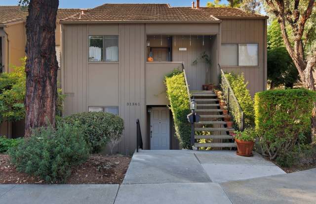 Lake and Golf Course View- Remodeled Condo w/ 2 Car Garage!