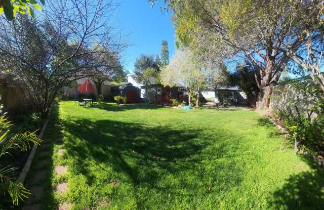 Well maintained 5 bedroom 2 bath with garage