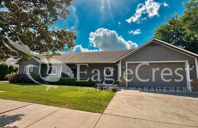 Contemporary Home With A Covered Patio & Quartz Countertops