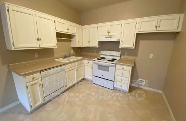 211 E. Robberson