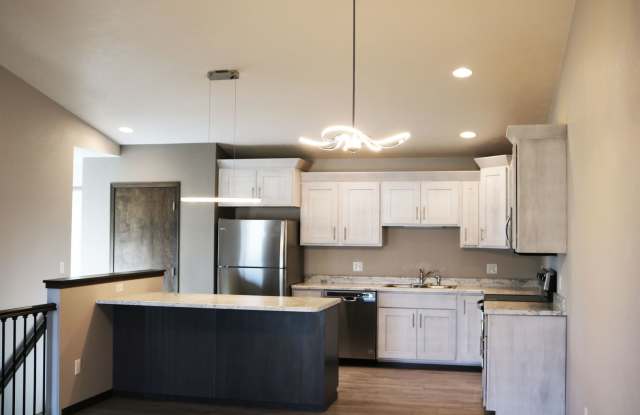 Photo of East Sioux Falls 4-Bedroom Townhome – Style, Space  Convenience!