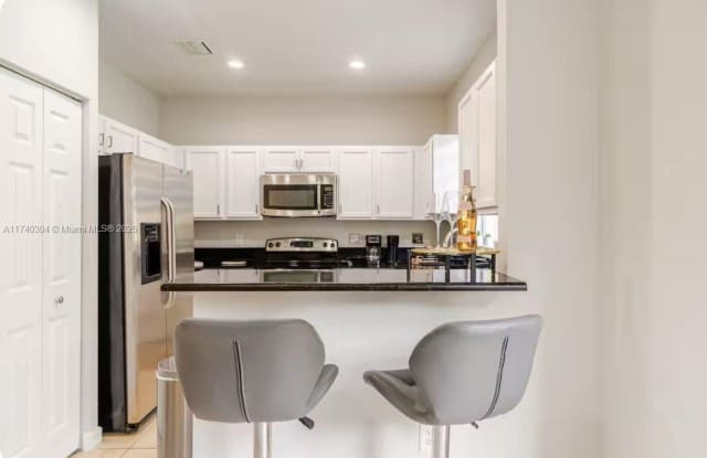 8763 NW 112th Place ., Doral, FL 33178