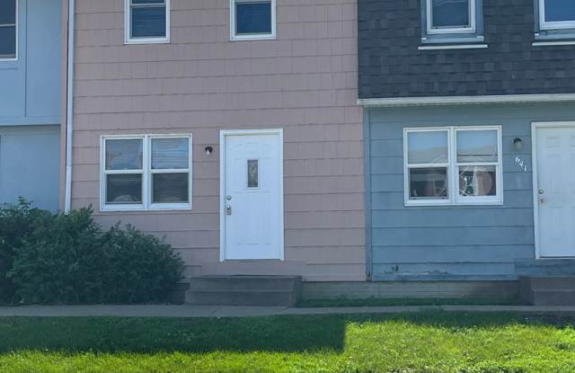 2 BR townhouse with basement and off street parking