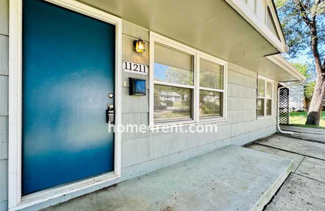 Ranch Style Home in KCMO w/ LVP Floors, SS Appliances and a Fenced Yard!