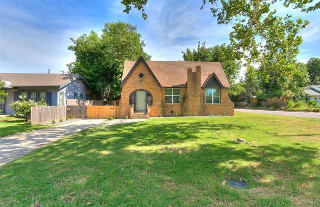 Welcome to 2040 NW 20th Street—your beautifully restored Tudor in the heart of Gatewood!