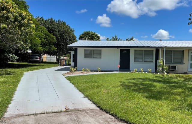 1099 Vineyard Place - 1099 Vineyard Place, Lehigh Acres, FL 33936