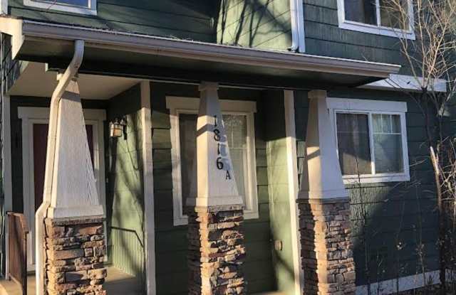 Charming 2br 1.5ba Two Level Condo in District 12 with Fenced Yard