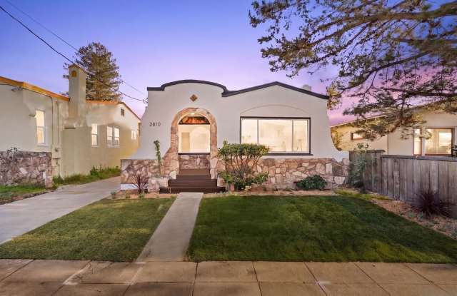Beautifully Updated Spanish-Style Home Featuring an En Suite Master and Redwood Deck