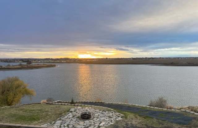 Waterfront! Sunset views! 3 bdrms! Attached garage! Private driveway!