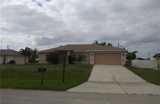 1308 NW 8th PL - 1308 Northwest 8th Place, Cape Coral, FL 33993