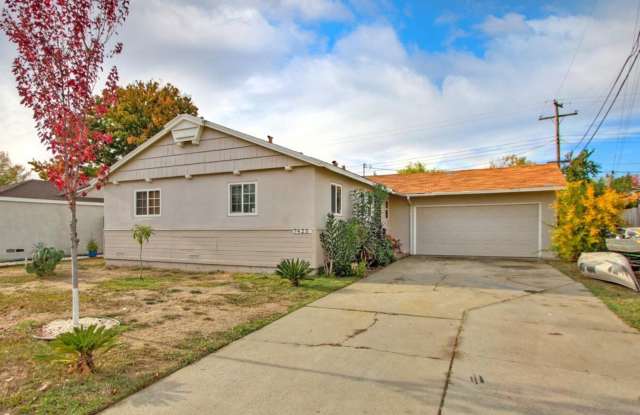 Family-Ready 3-Bedroom Home with Large Yard  Garage