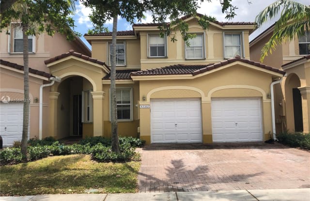 12382 SW 124th Ter - 12382 SW 124th Terrace, Three Lakes, FL 33186