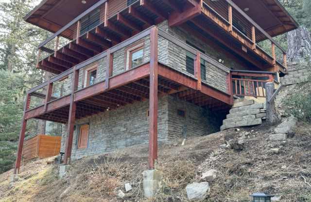 Photo of 2-Bed, 1-Bath Mountain Cabin Retreat with Hot Tub, Views  Wraparound Deck!