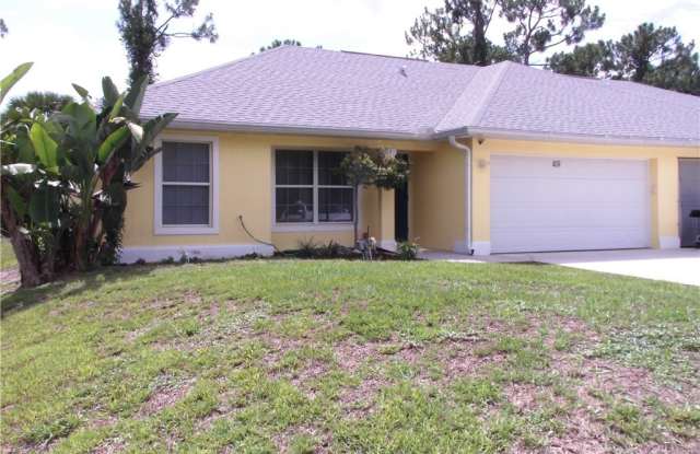 409 Chalet Avenue S - 409 Chalet Avenue South, Lehigh Acres, FL 33974