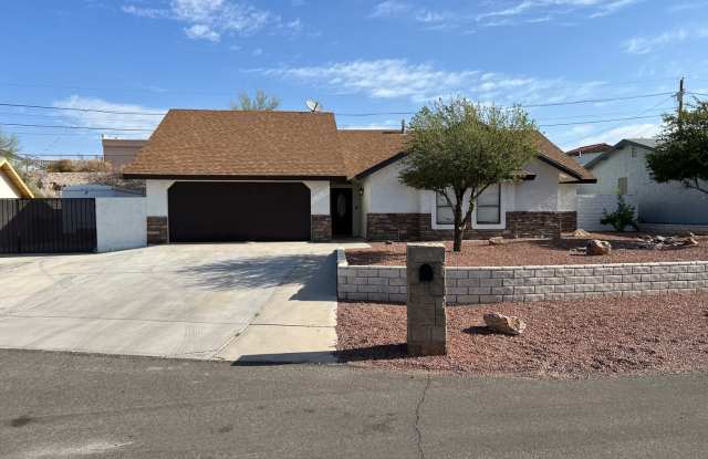 Photo of Spacious 3-Bedroom, 2-Bath Home with Den  RV Parking in a Bullhead City Prime Location