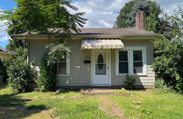Sunny North Hill Bungalow • Hardwood Floors, Garage  Fenced Yard