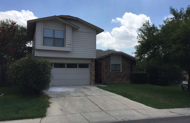 NICE 3 BEDROOM LOCATED ON A LARGE CORNER LOT*COUNTRY KITCHEN WITH ISLAND*LARGE MASTER BR DOWN W/ OUTSIDE ACCESS*FIREPLACE IN LIVING*EASY ACCESS TO RANDOLPH AFB, FT. SAM,  SHOPPING