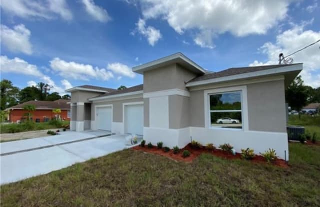 117 Meadow Road - 117 Meadow Road, Lehigh Acres, FL 33973