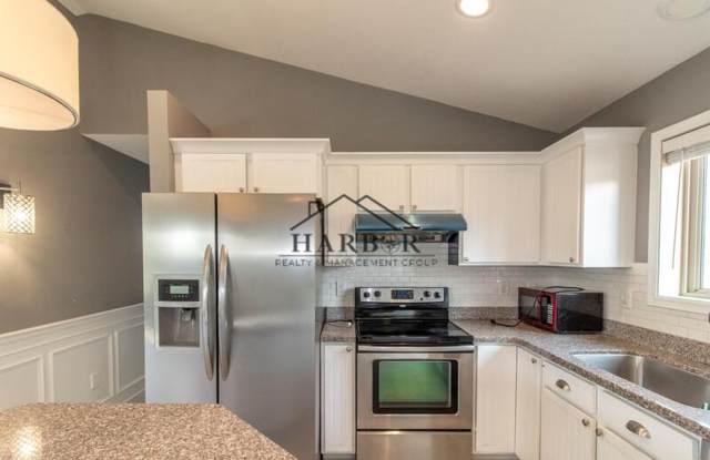 Updated 4 Bedroom Home with Remodeled Kitchen & Tiered Deck