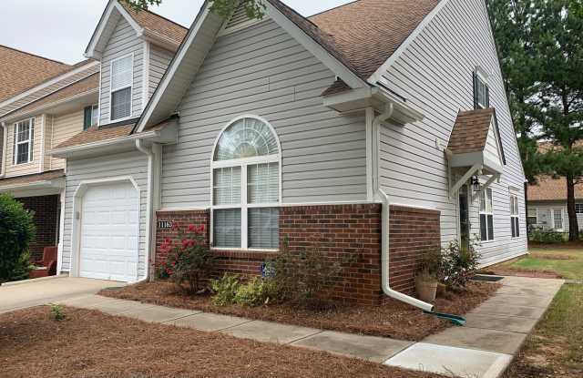 Photo of End Unit Townhome located in the Covington at Providence Subdivision!
