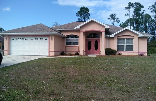 1247 Echo ST E - 1247 Echo St E, Lehigh Acres, FL 33974