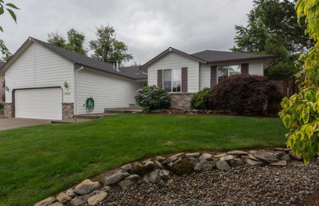 Charming 4-Bed, 2-Bath Home with Vaulted Ceilings, Dual Fireplaces & Serene Outdoor Spaces