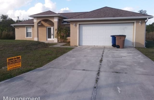 733 Newhall St E - 733 Newhall Street East, Lehigh Acres, FL 33974